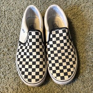 Vans Black and White Checkerboard Slip-On Sneakers
